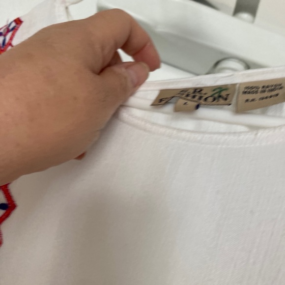 A. F. Fashion white gauze dress size large with some geometric decor. - Picture 10 of 13